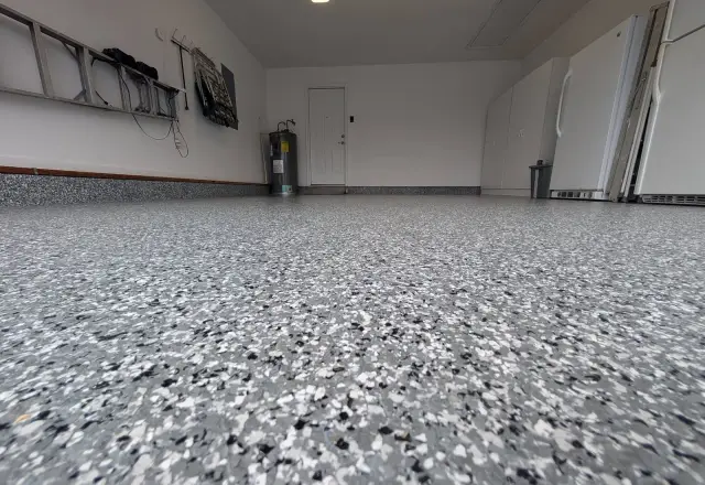 Close view of a full-broadcast flake floor