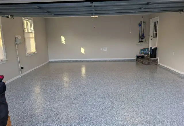 Glossy light flake floor in a bright two-car garage